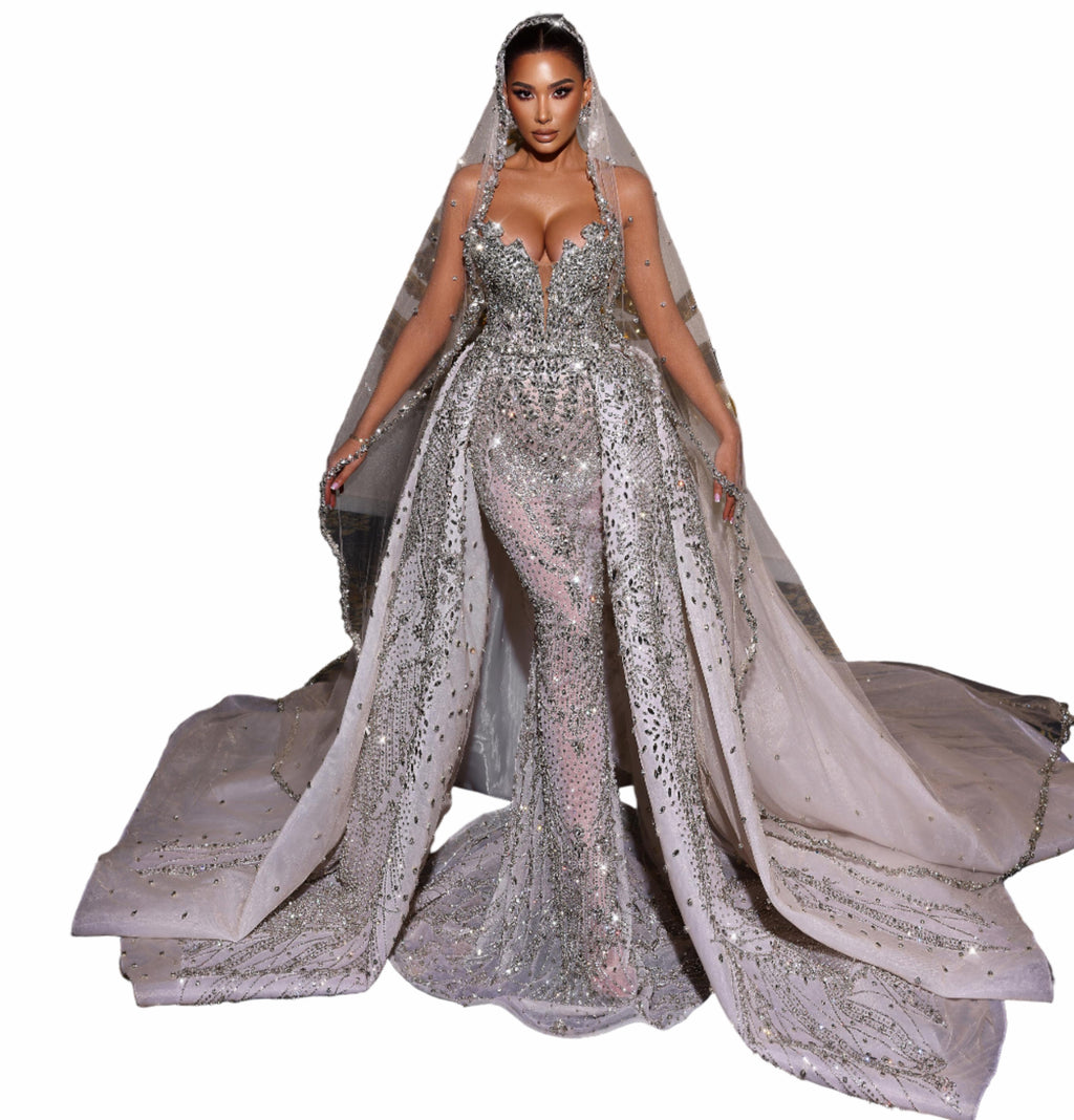 Woman in a sparkling silver wedding gown 