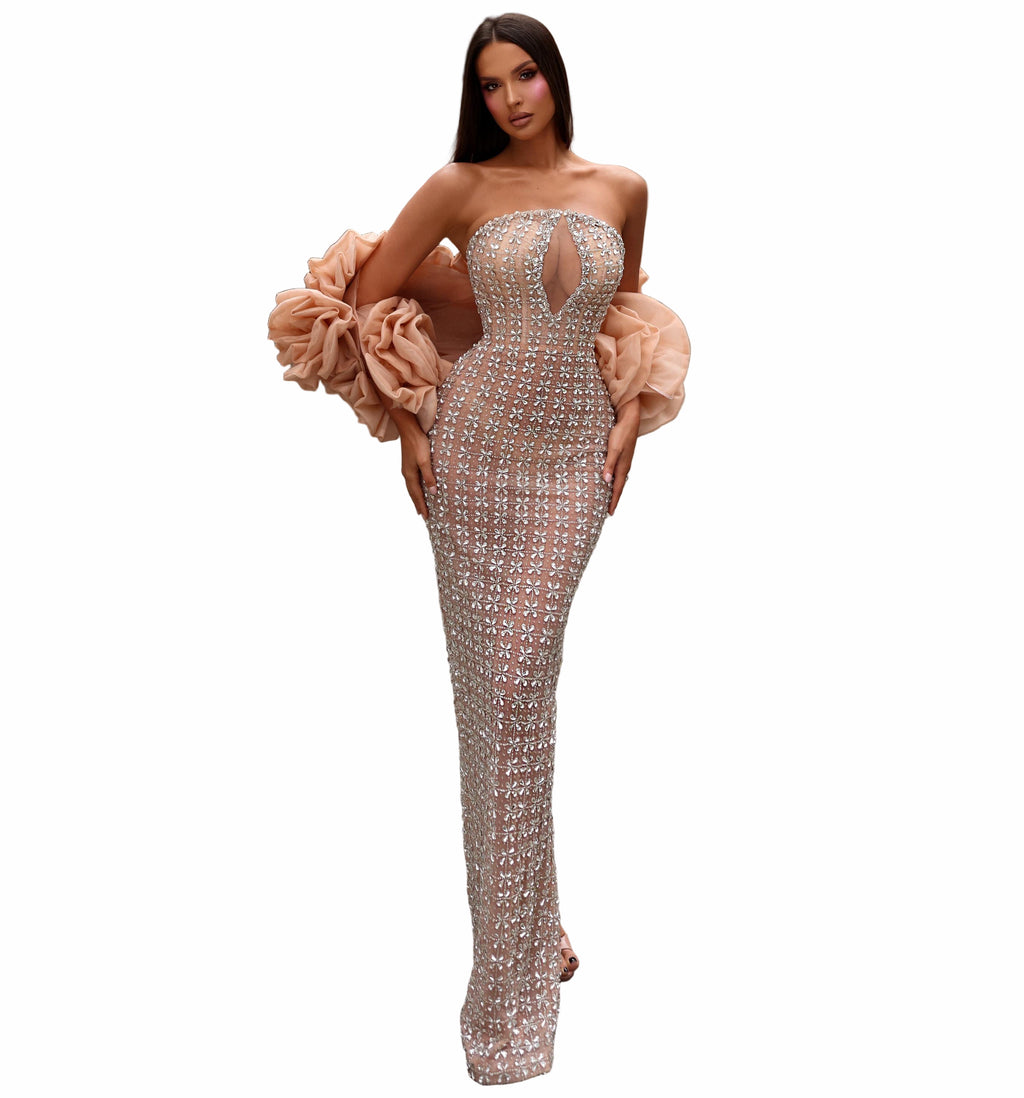 Woman in a sparkling dress with a fur stole