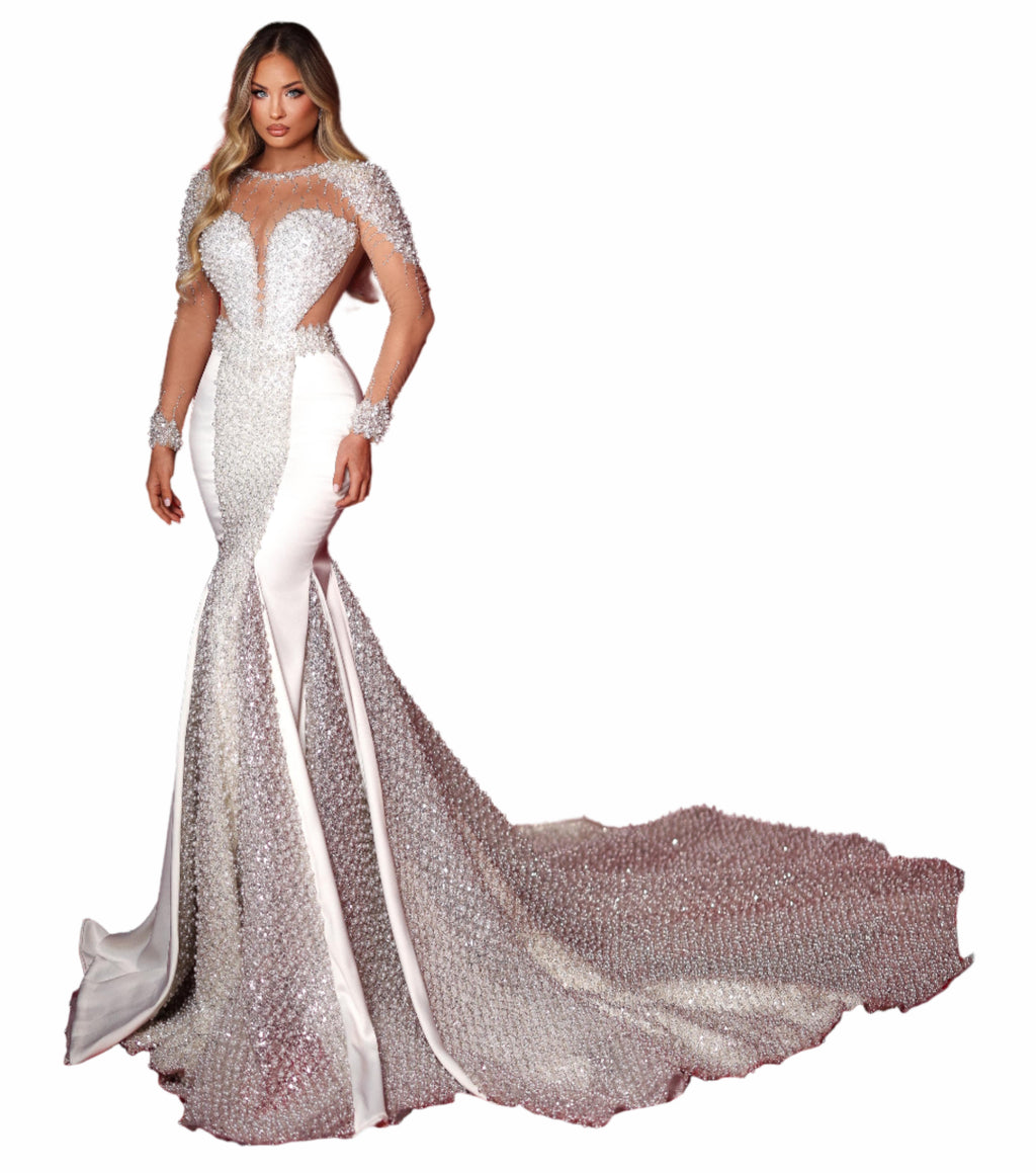 Woman in a white beaded gown 