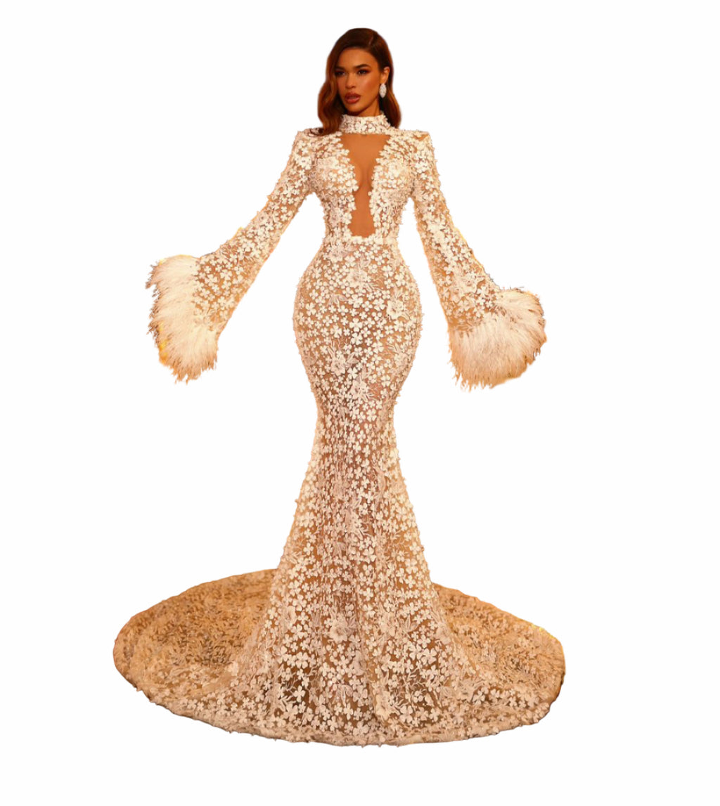 Woman in a sparkling evening gown in an elegant indoor setting