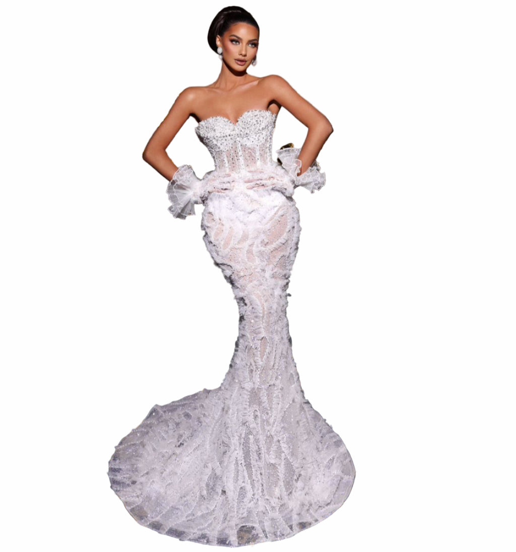 Woman in a white strapless gown 