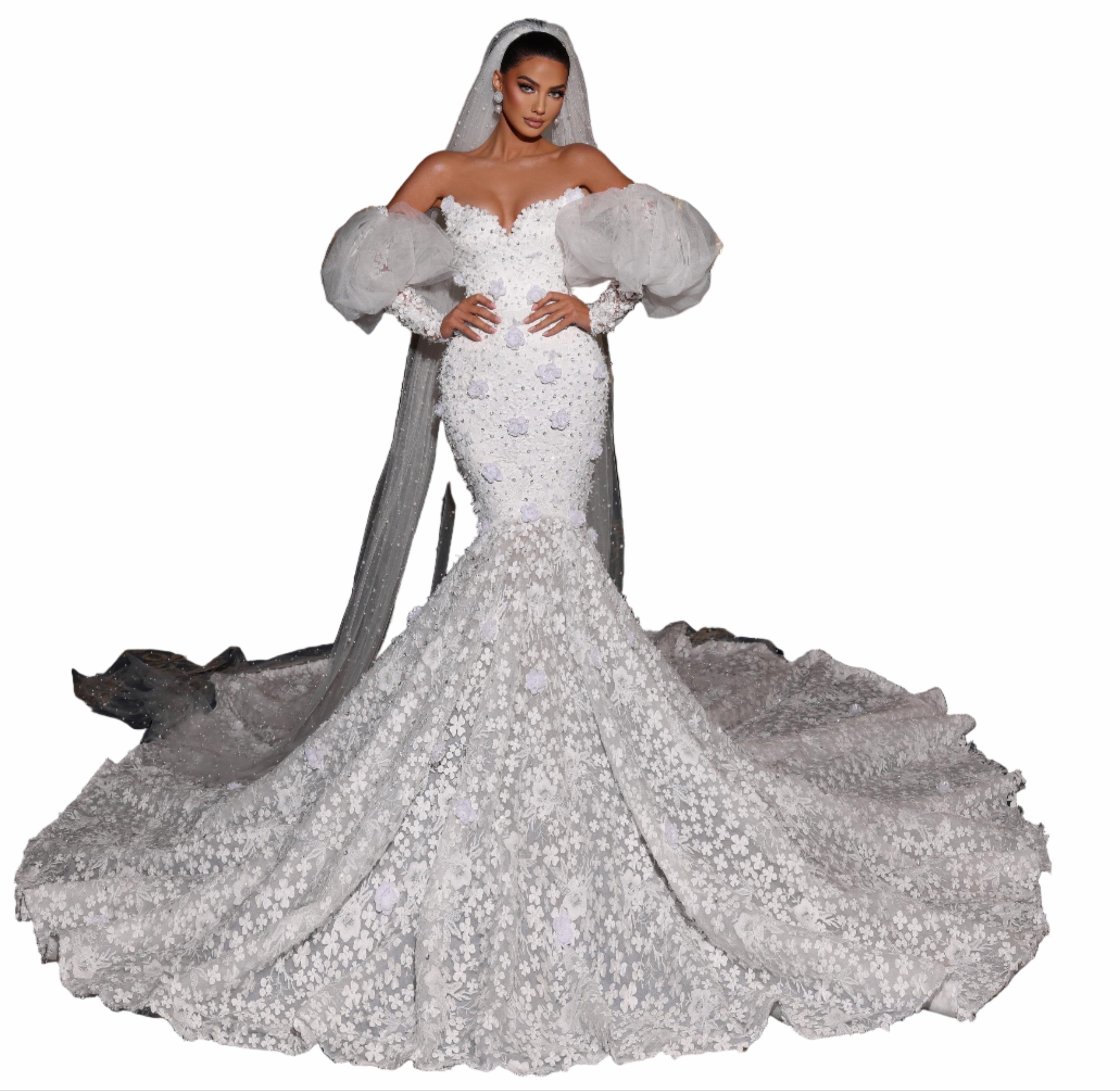 Woman in a white wedding dress with a long train 