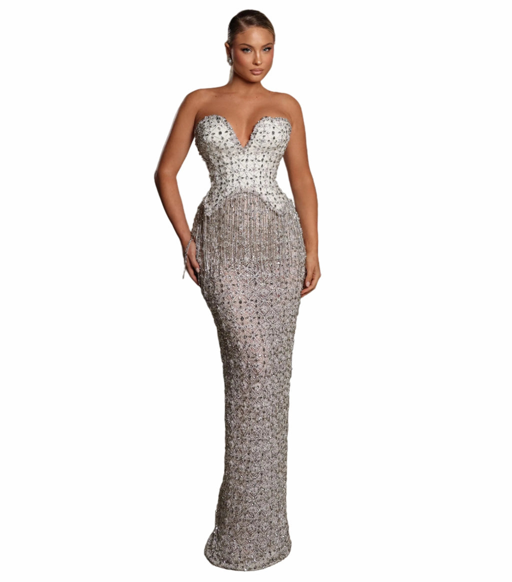 Woman in a silver strapless gown